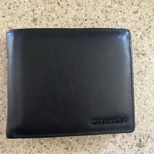 A Valentino Bi-fold Wallet.